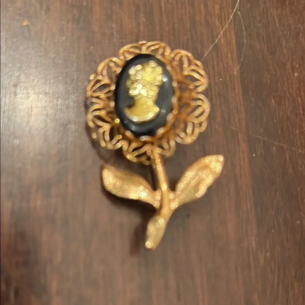 Intricate Gold and Black Flower Cameo Brooch